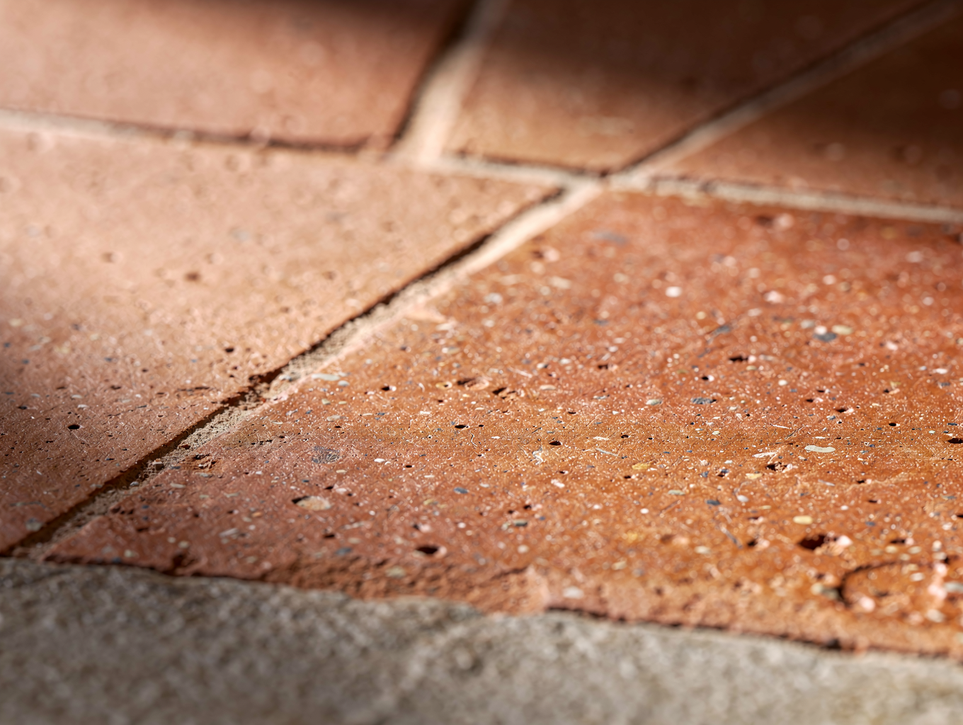 Close up of terracotta textures and warm lighting